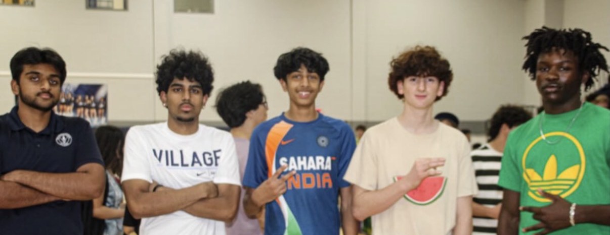 Mehdi with friends at the Village